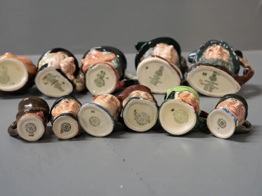 11 Royal Doulton small character jugs - 5 medium H-65 and 6 miniature Image 1++