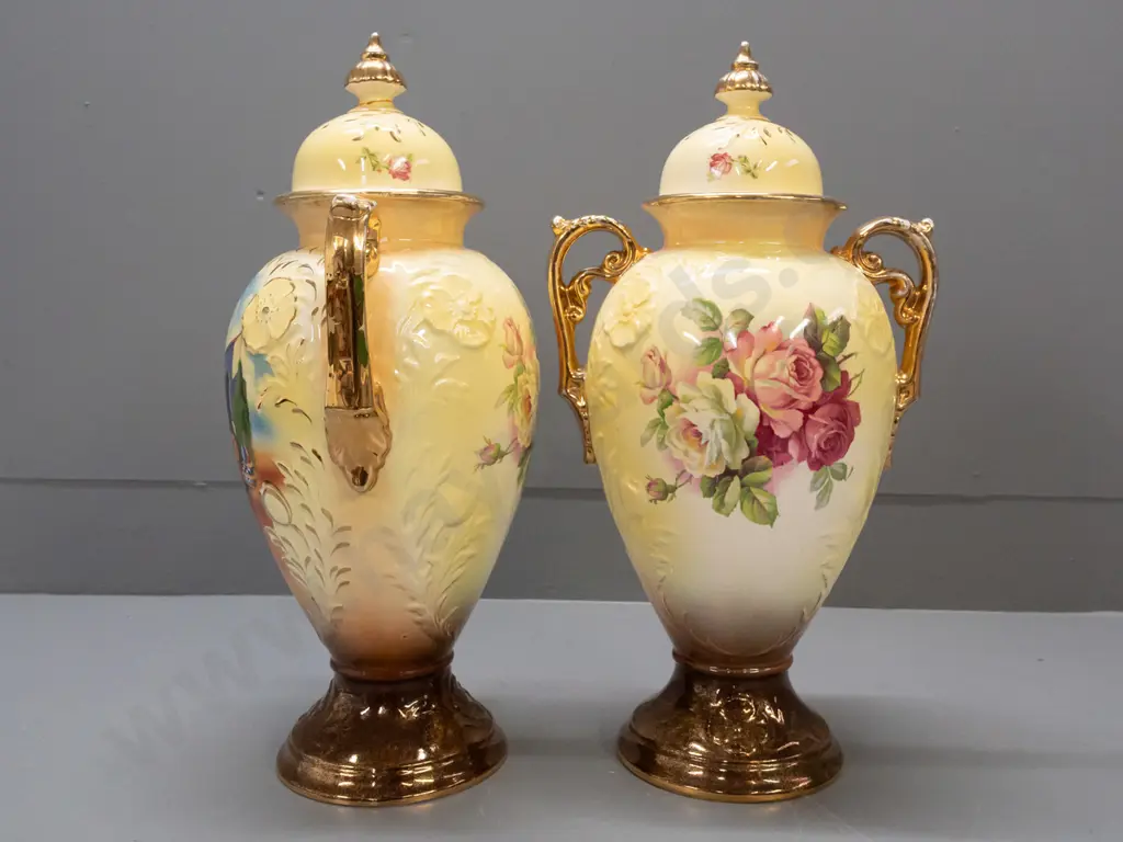 pair of Falconware lidded handled vases with Egyptian scenes & gilt decoration - repair to one finial, some wear to gilt Image 1++