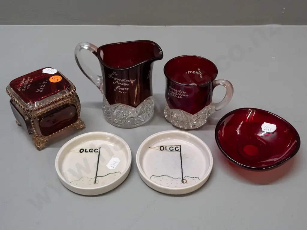 3 pieces of red Dunedin 1925-26 exhibition glass including lidded trinket with gilt decoration, two OC Stephens OLGC pin Image 1++