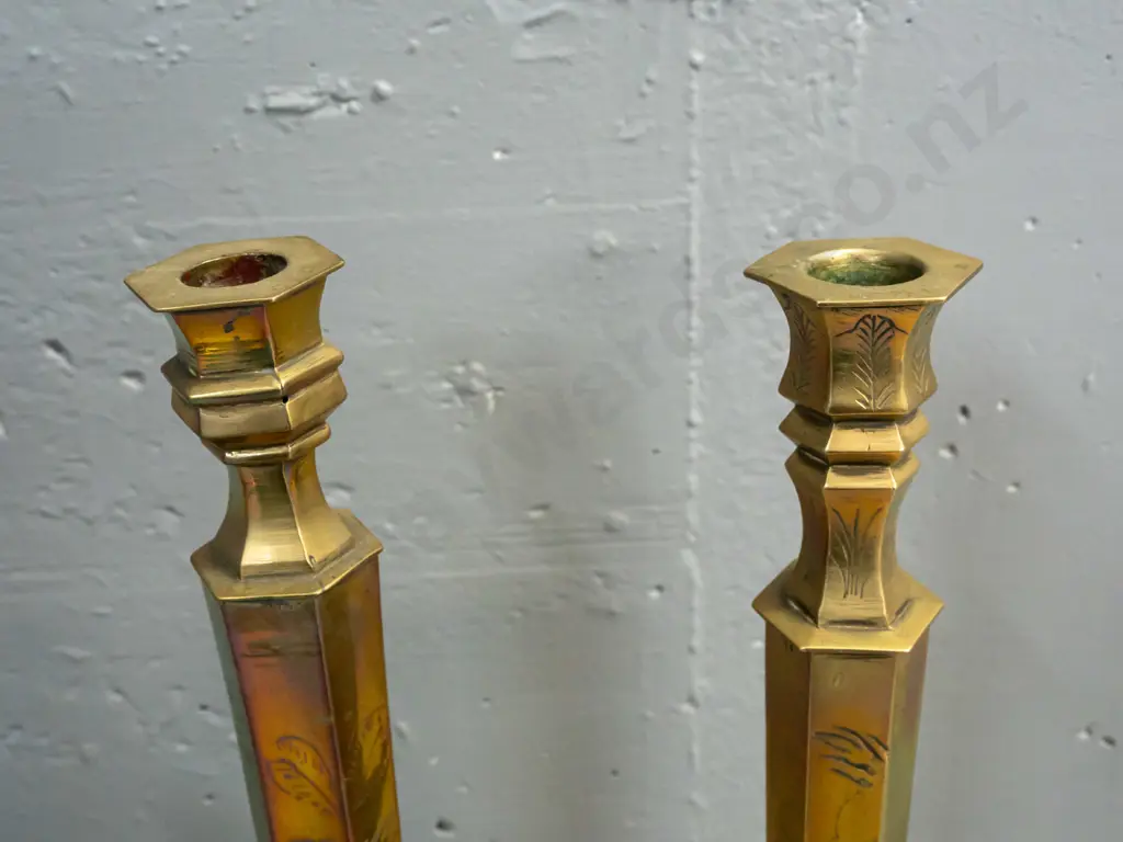 2 pairs of brass candlesticks - engraved larger pair not quite matching, and open-twist pair has some corrosion to base Image 1++