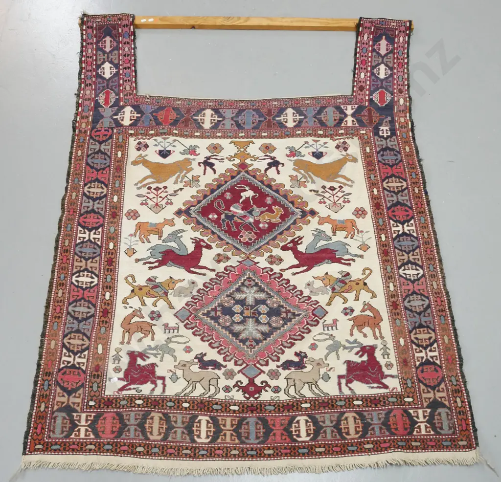 Persian style hand tufted flat weave wool floor rug with rectangular cutout, roughly nailed to pine hanging bar - animal Image 1++