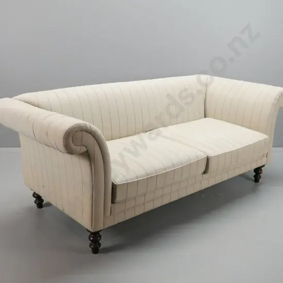 vintage rolled-arm 3-seater couch with squat turned feet, 2 loose squabs, reupholstered in striped fabric - some wear to