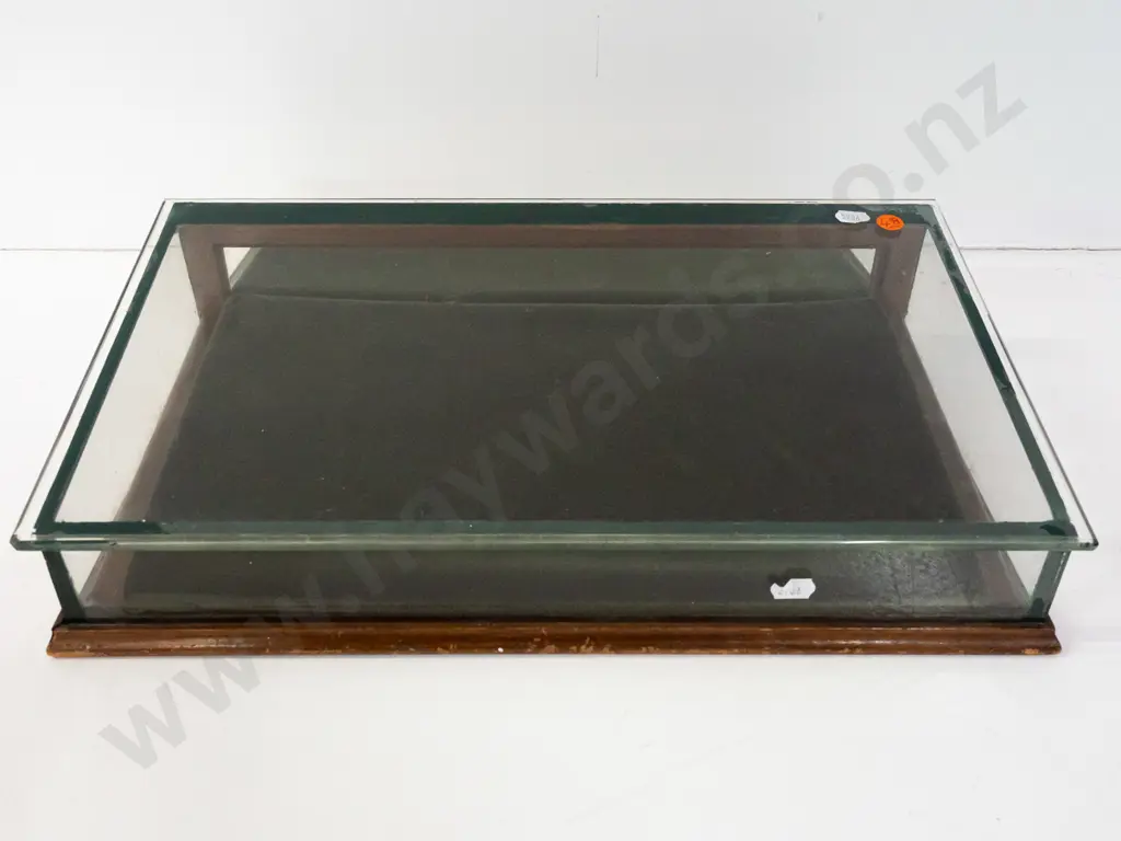 glazed slope fronted counter jewellery display case with hinged mirrored back, felt-lined. Some chipping to edge of Image 1++