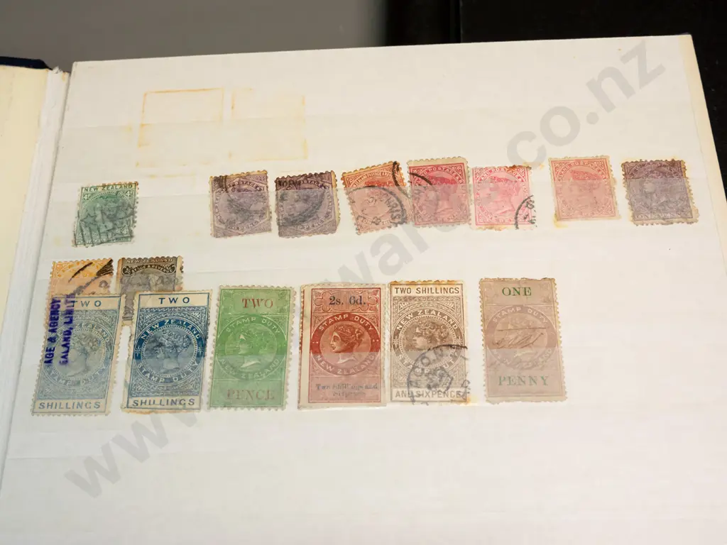 3 stamp albums with New Zealand contents, dating from circa 1870s half penny newspaper stamps onward Image 1++