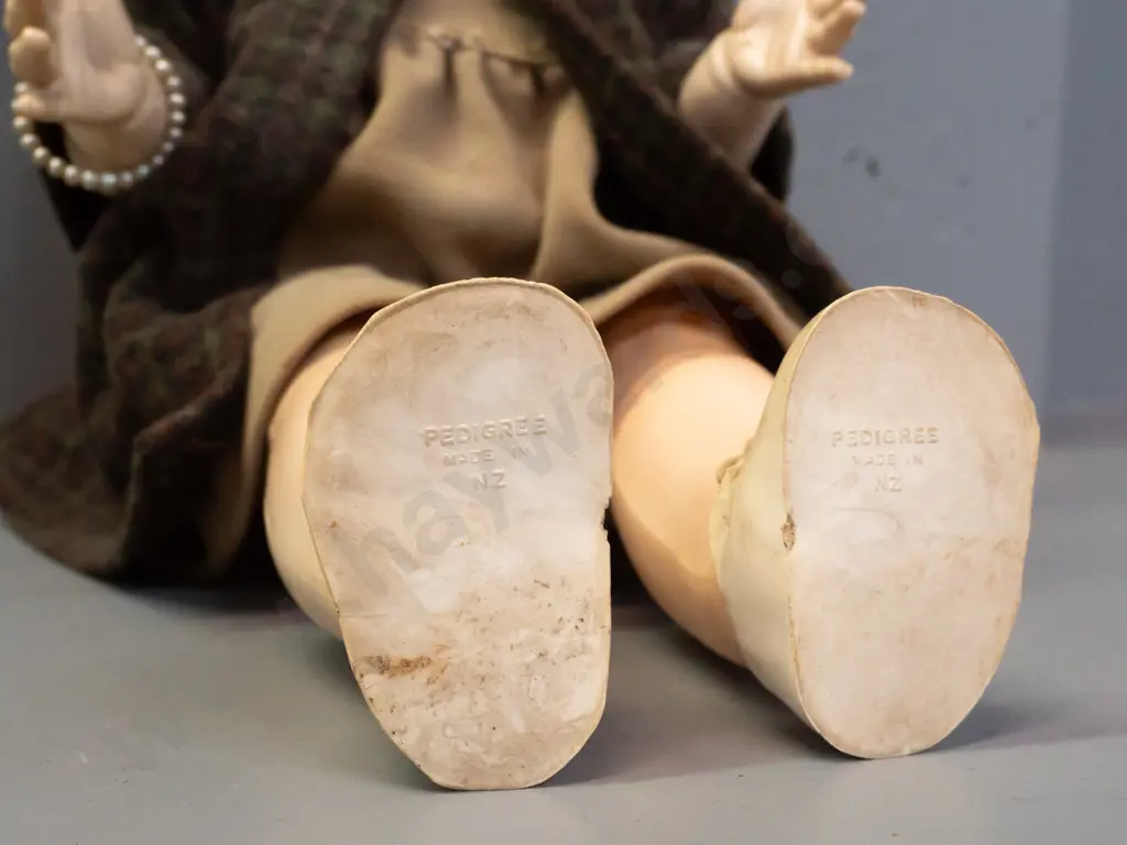 vintage Pedigree New Zealand doll with tweed coat, straw hat, open-and-close eyes, damage to one eyelash, missing one Image 1++