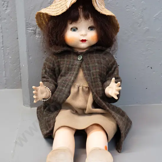vintage Pedigree New Zealand doll with tweed coat, straw hat, open-and-close eyes, damage to one eyelash, missing one