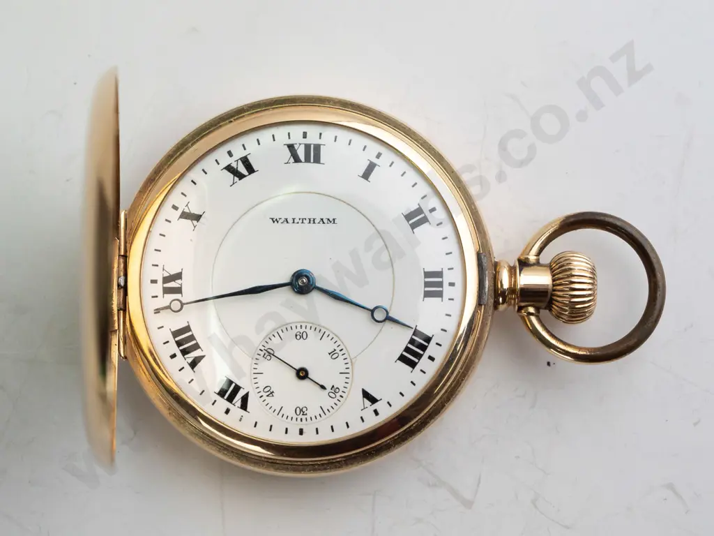 Waltham 14ct pocket watch, jewelled barrel, capped pallets and escape, diamond endstones, excellent movement Image 1++