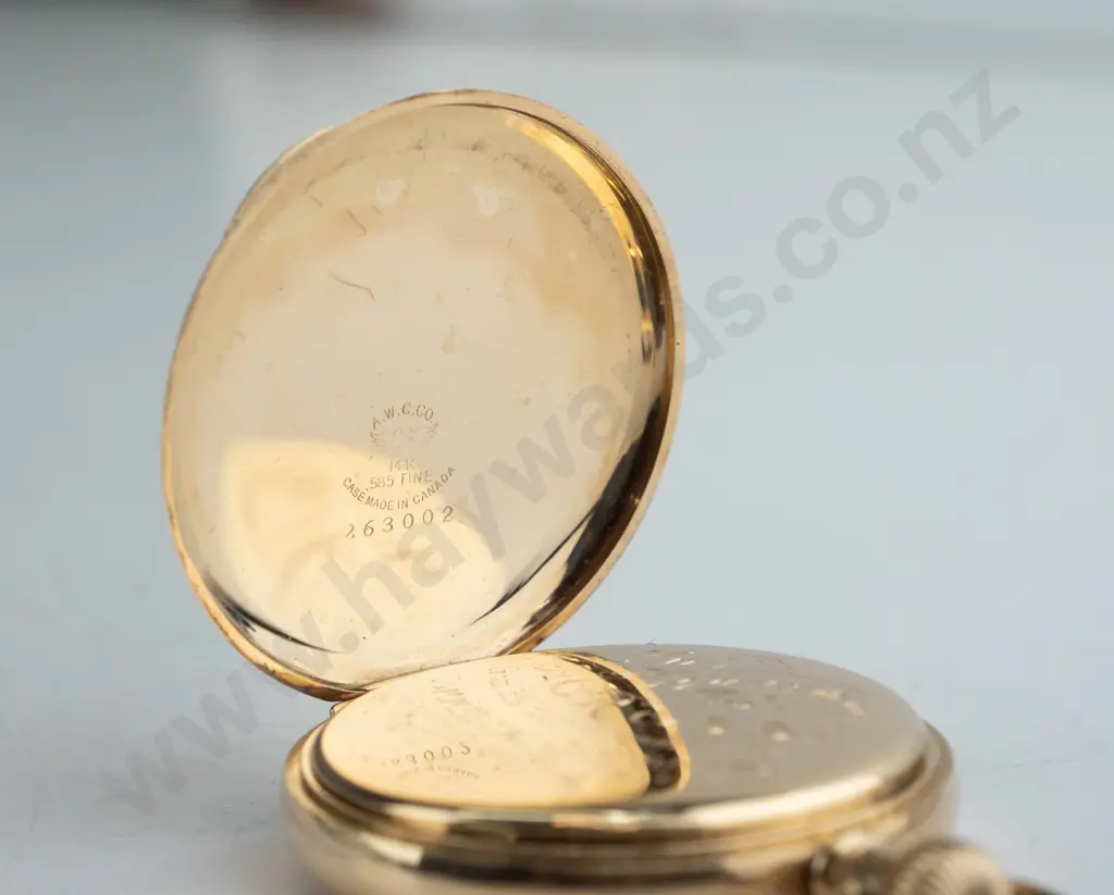 Waltham 14ct pocket watch, jewelled barrel, capped pallets and escape, diamond endstones, excellent movement Image 1++