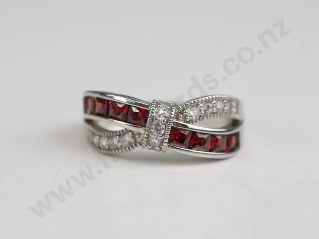 silver garnet crossover ring stamped 925 Image 1++