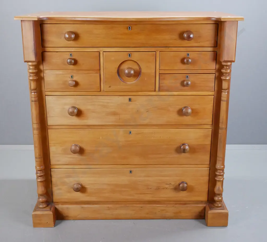 vintage rimu 8-drawer chest with turned columns and wooden knobs, brass escutcheons, on plinth base. Split to one side, Image 1++
