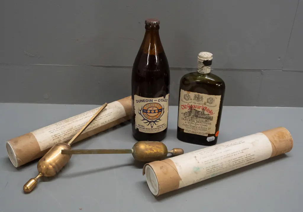 2 brass hydrometers, 1977 Deerstalkers Association Speights beer bottle and John Dewar & Sons whisky, both sealed Image 1++