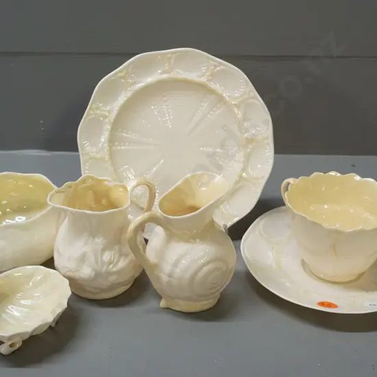 Belleek green mark items - trio, 2 jugs, bowl and an open salt - smaller jug has chip to rim, other jug H-90