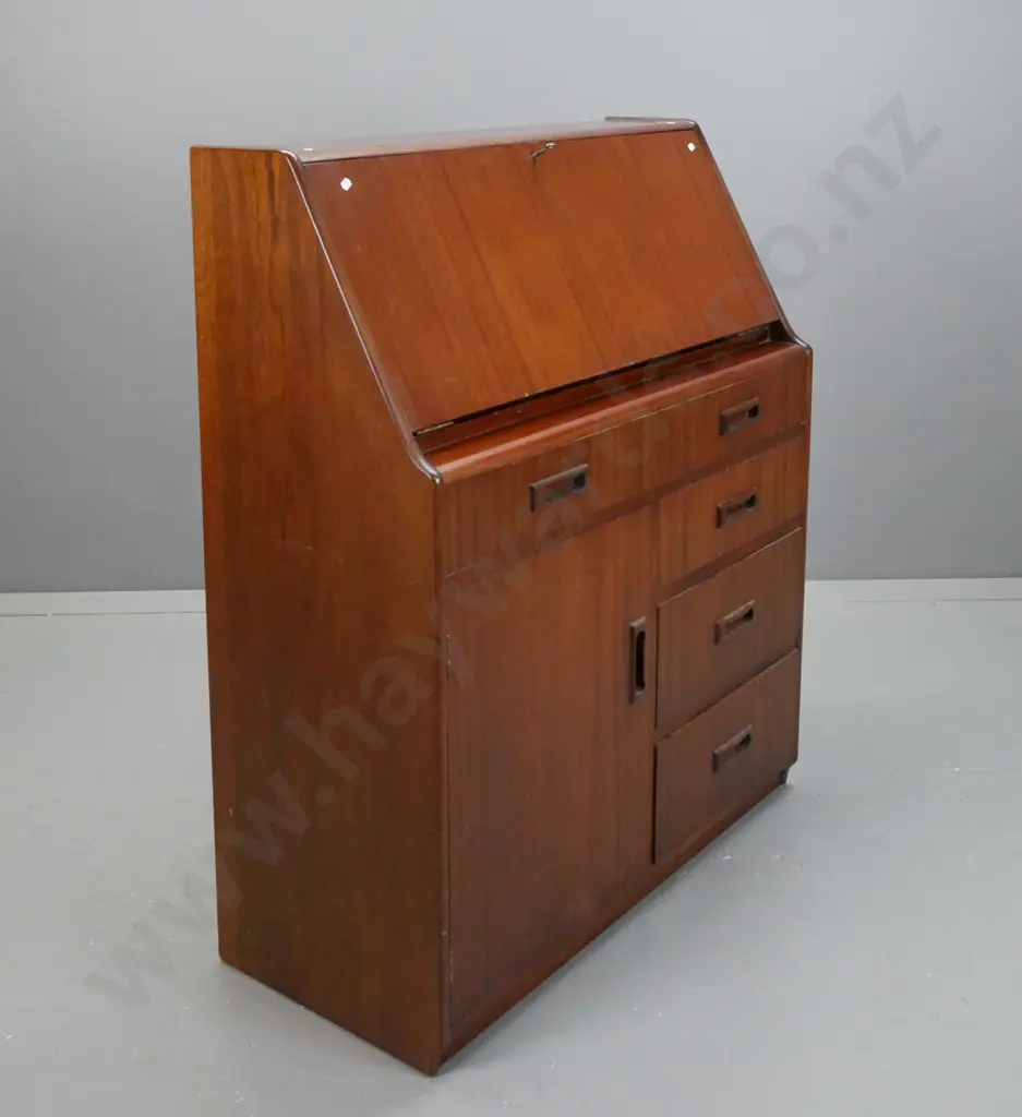 retro mahogany fold-front desk, one long drawer, cupboard door flanked by three small drawers, fold-front exposing Image 1++