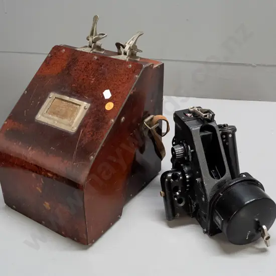 vintage bubble sextant in fitted composite or bakelite case - marked AM / Mark IXa - with strap clip on top. Some age