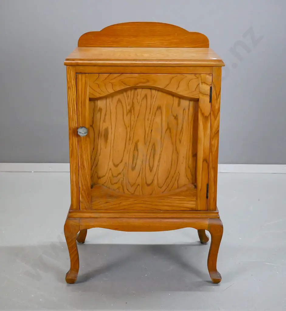 vintage oak and elm cab leg bedside cabinet w/ panelled door, bakelite handle. A few dents to top edge, borer in back & Image 1++
