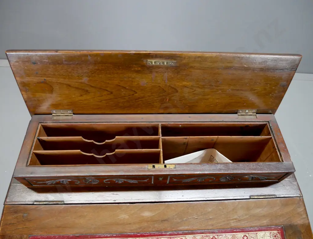 Assetic walnut, davenport, with lift-up lid exposing letter rack, red tooled leather slop front lifting Image 1++