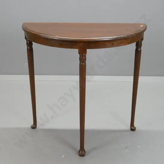 vintage dark brown stained NZ-made half round hall or end table with rimu top, on turned mahogany legs with pad feet -