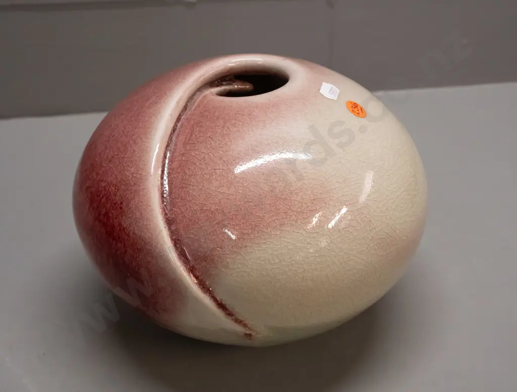New Zealand studio pottery squat sphere shaped vase - mark DM? - red over light green H-170 W-230 Image 1++