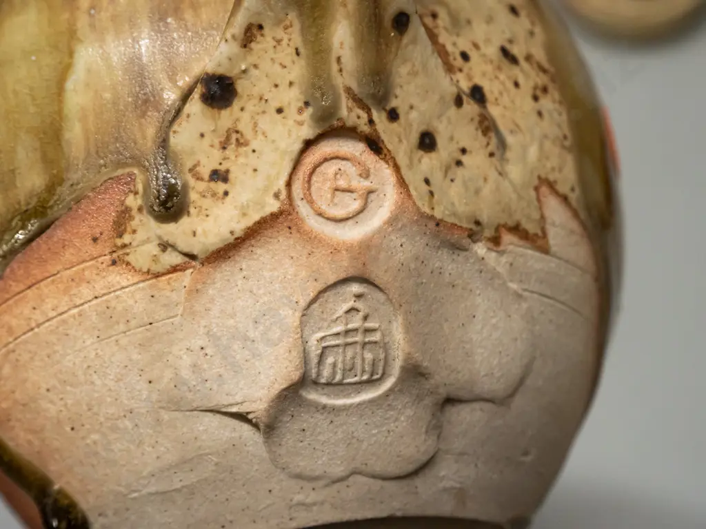 2 pieces of studio pottery, unknown marks - teapot with applied decoration H-160 L-220 and a jug with wood-fired glaze - Image 1++