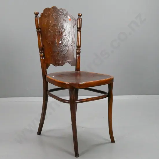vintage Austrian beech chair with bent wood frame and press-carved back and seat. Frame loose at joins, needs tightening