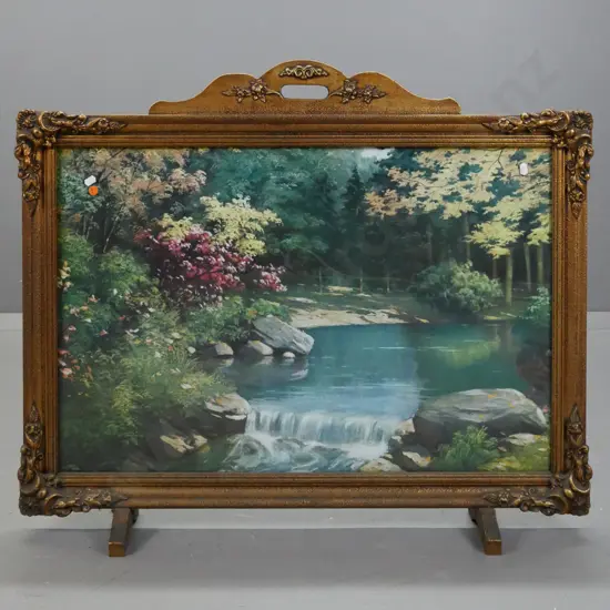 Mid-century fire screen gilded & stippled frame w/ foliate corners & shaped top handle. Glazed print of forest scene.