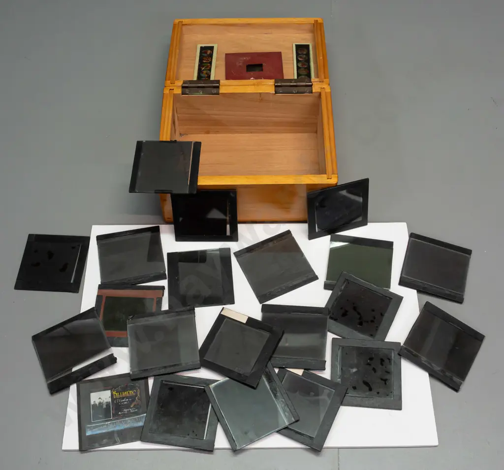 wooden box with assorted glass lantern slides, mostly (hand painted?) amateur houses and scenics, including a 16mm film Image 1++