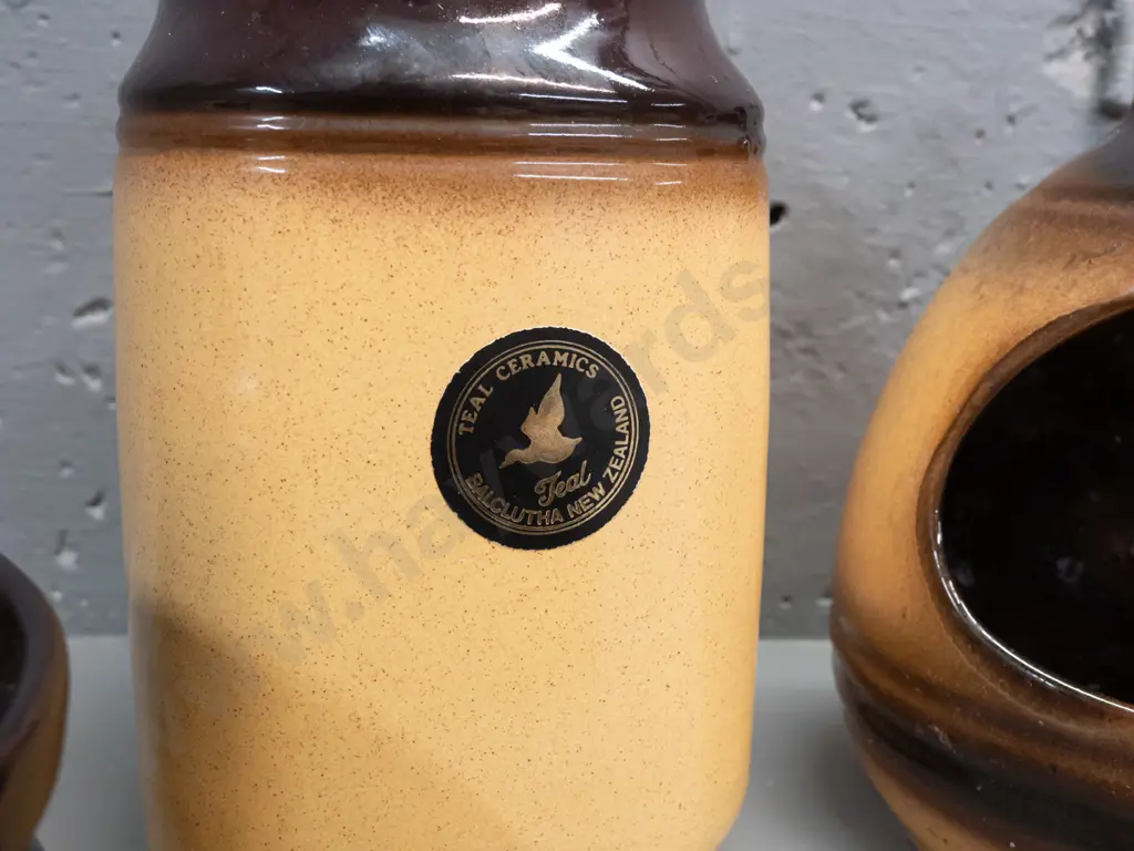 4 pieces Teal NZ pottery - salt pig, lidded canister, 2 lidded casseroles & a Te Rona lidded canister. Large casserole Image 1++