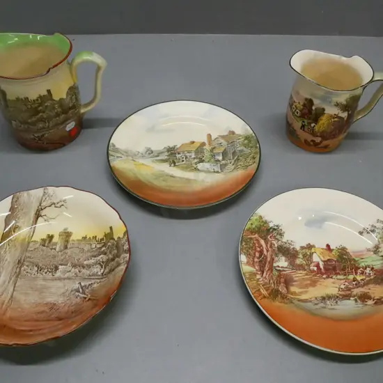 5x Royal Doulton mixed lot: jug & plate Arundel Castle scene, jug & 2x plates Rustic England. One plate crazed & stained