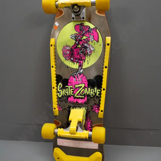 1980s skateboard with "Skate Zombie" design - good condition but some wear and scuffing from use, corrosion to screws