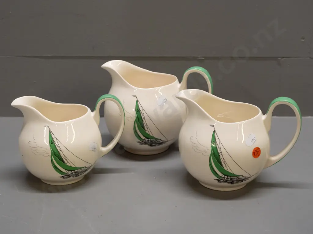 3 retro Palissy green Regatta jugs, all with some staining inside, and 2 with small chips to glaze on handles. Image 1++