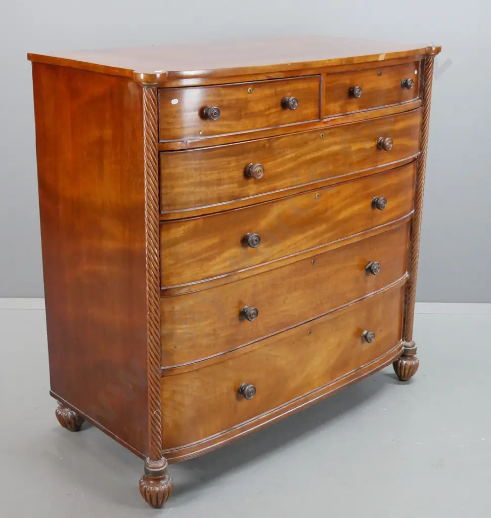 antique regency bow front 6-drawer chest with twist columns, turned wooden knobs, on fluted melon-shaped feet. Some Image 1++