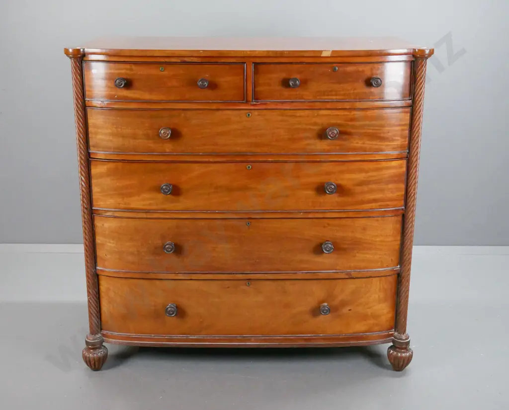 antique regency bow front 6-drawer chest with twist columns, turned wooden knobs, on fluted melon-shaped feet. Some Image 1++
