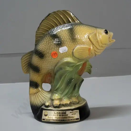 Jim Beam National Freshwater Fishing decanter, paper seal worn but intact, marked 1980 on base, label peeling away H245