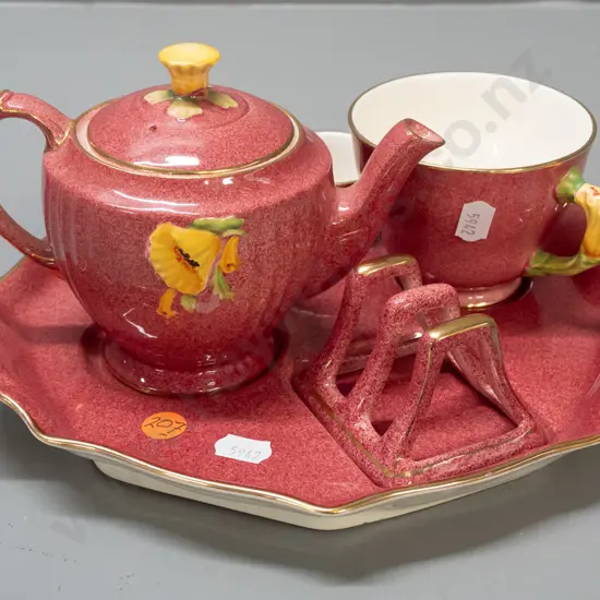 Royal Winton breakfast set with teapot, cup, jug, sugar and toast rack on tray - gilded decoration on coral pink - minor