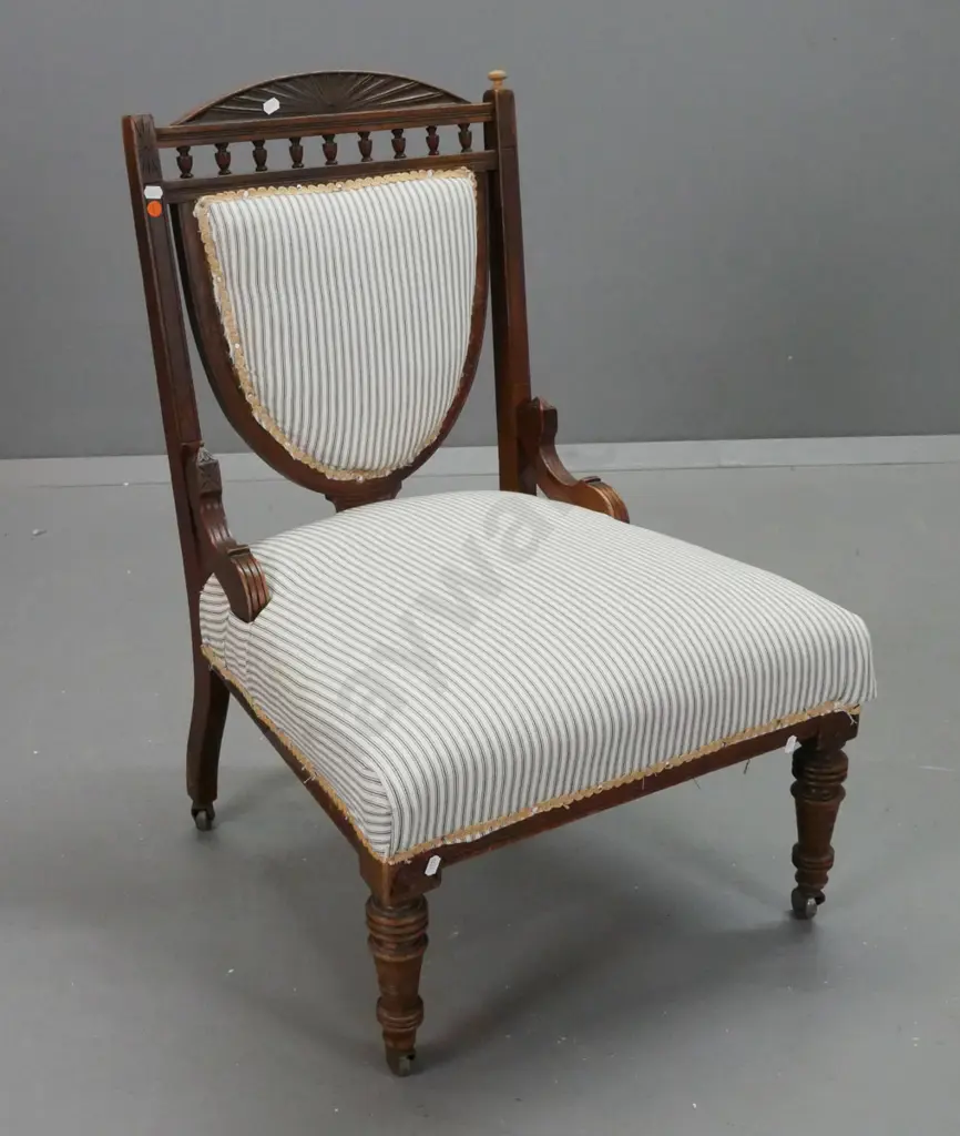 Edwardian walnut bedroom chair w/ oval fan decorated crest above turned gallery, shield-shaped ticking-upholstered Image 1++