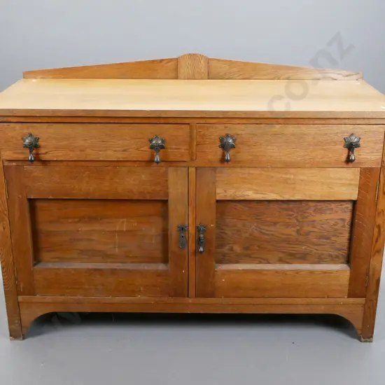 vintage arts & crafts oak sideboard, with 2 long drawers above 2 panel doors, metal drop handles,