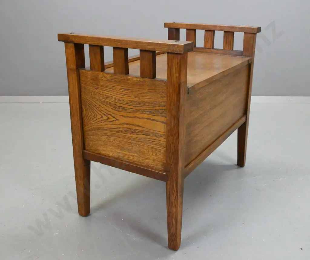 arts & craft style oak lift up lid piano stool, square tapered legs, paneled front & sides, some stains to seat top Image 1++