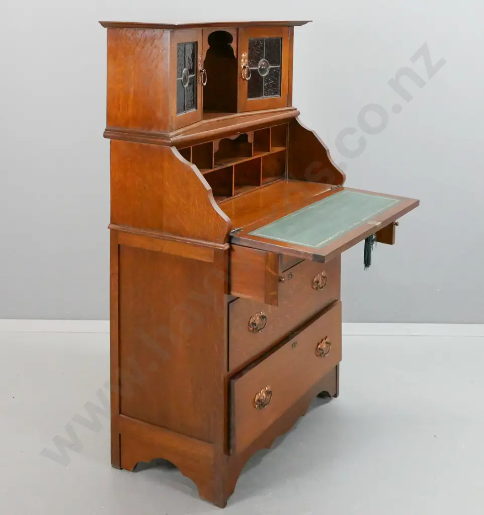 vintage arts & crafts style oak drop-front bureau with 3 lower drawers, 2 leadlight cupboard doors in top, Image 1++