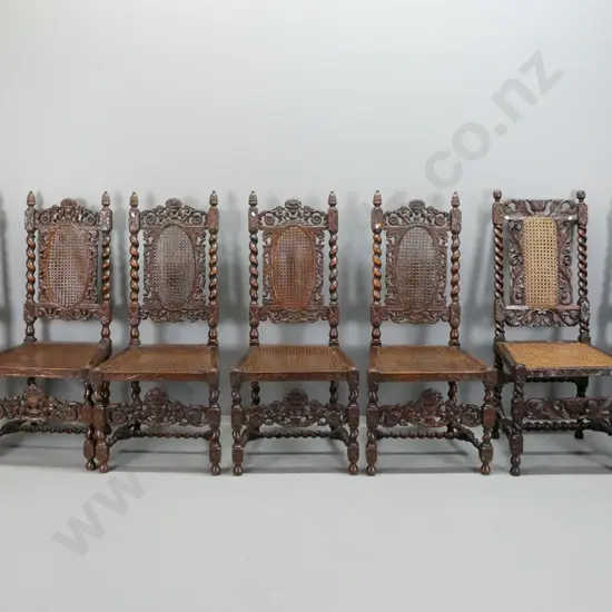 7x 19th century northern European Jacobean style oak dining chairs, 6 matching and one odd, with hand woven cane seat &