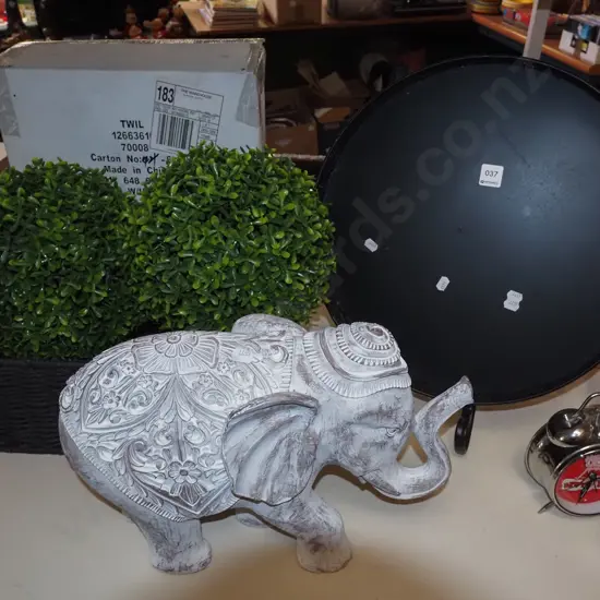 tin tray, metal stans, wooden elephant, faux shrubs etc Elephant H300