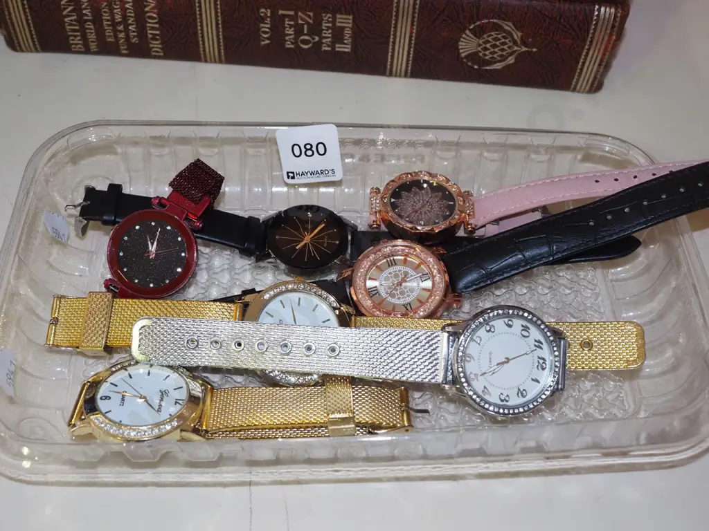 plastic tray of watches Image 1++