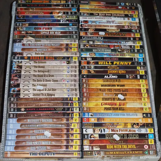 box of cowboy DVDs