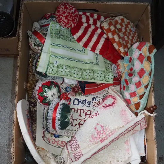 box; needleworks, table cloths, hats etc