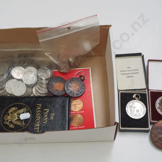 box of various souvenir and other coins