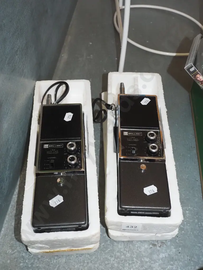 pair of hand held walkie talkie radios Image 1++