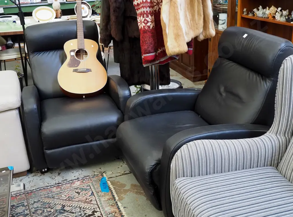 pair of black leather reclining armchairs Image 1++