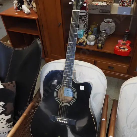 Axman acoustic-electric guitar - chip to back of headstock