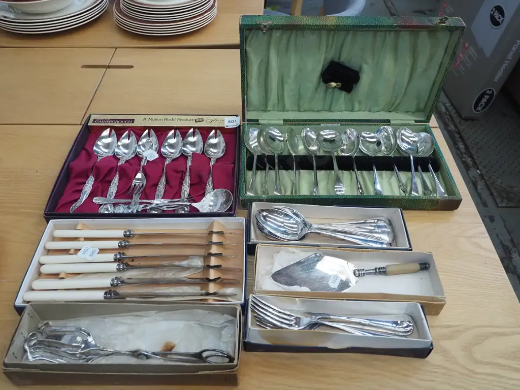 assorted plated cutlery; spoons, knives, tongs etc Image 1++