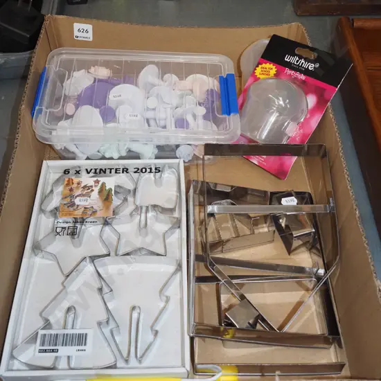 box; cookie cutters, muffin storage canisters