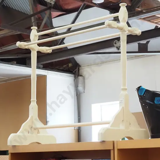 white painted wooden towel rail